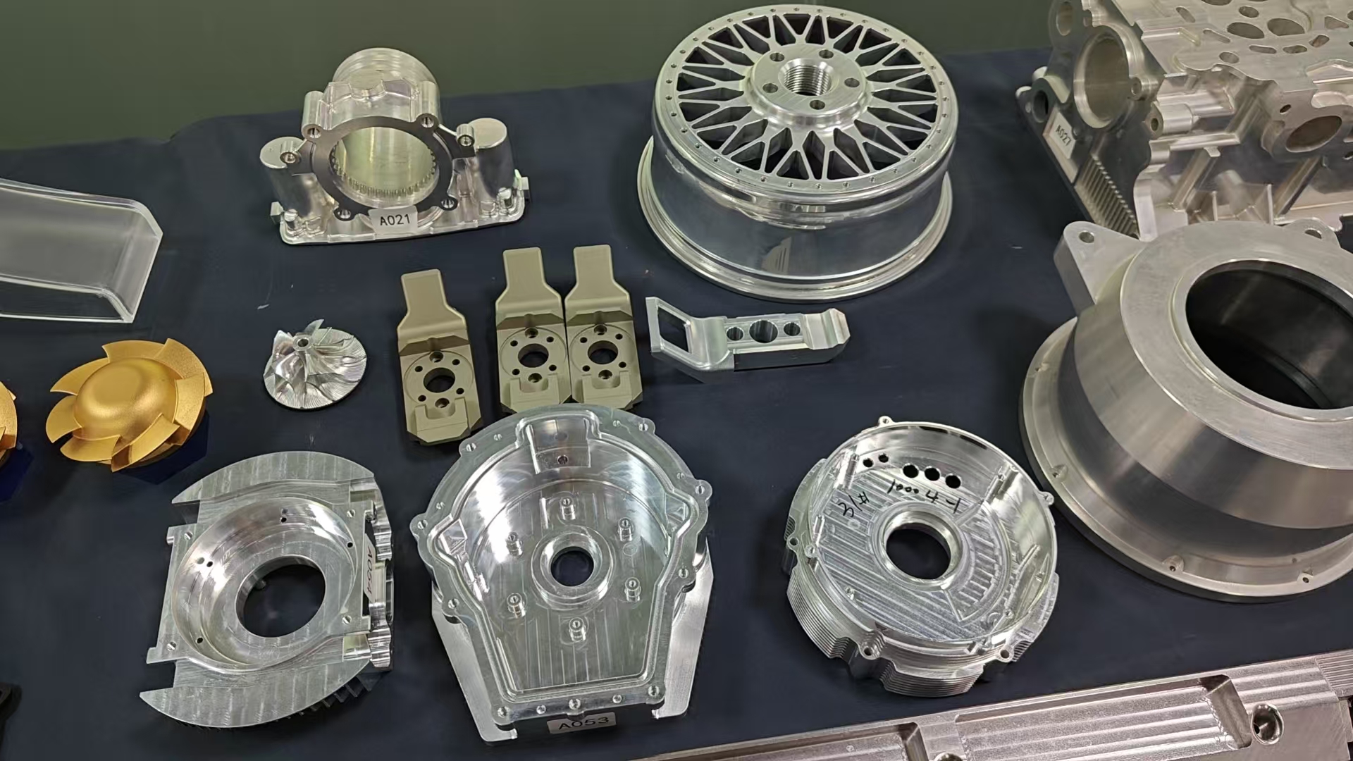 CNC machined aluminum and steel prototype parts with precision milled surfaces and threaded holes for functional testing